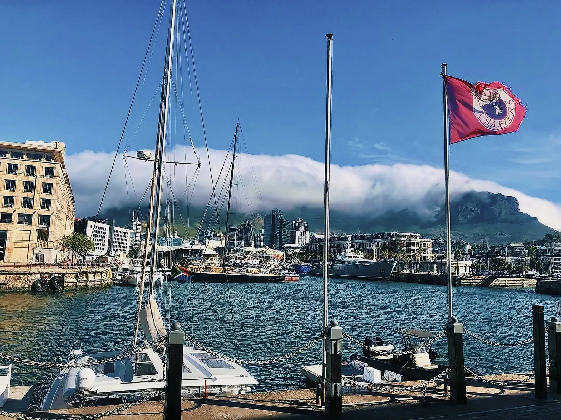 clouds over table mountain looking from waterfront