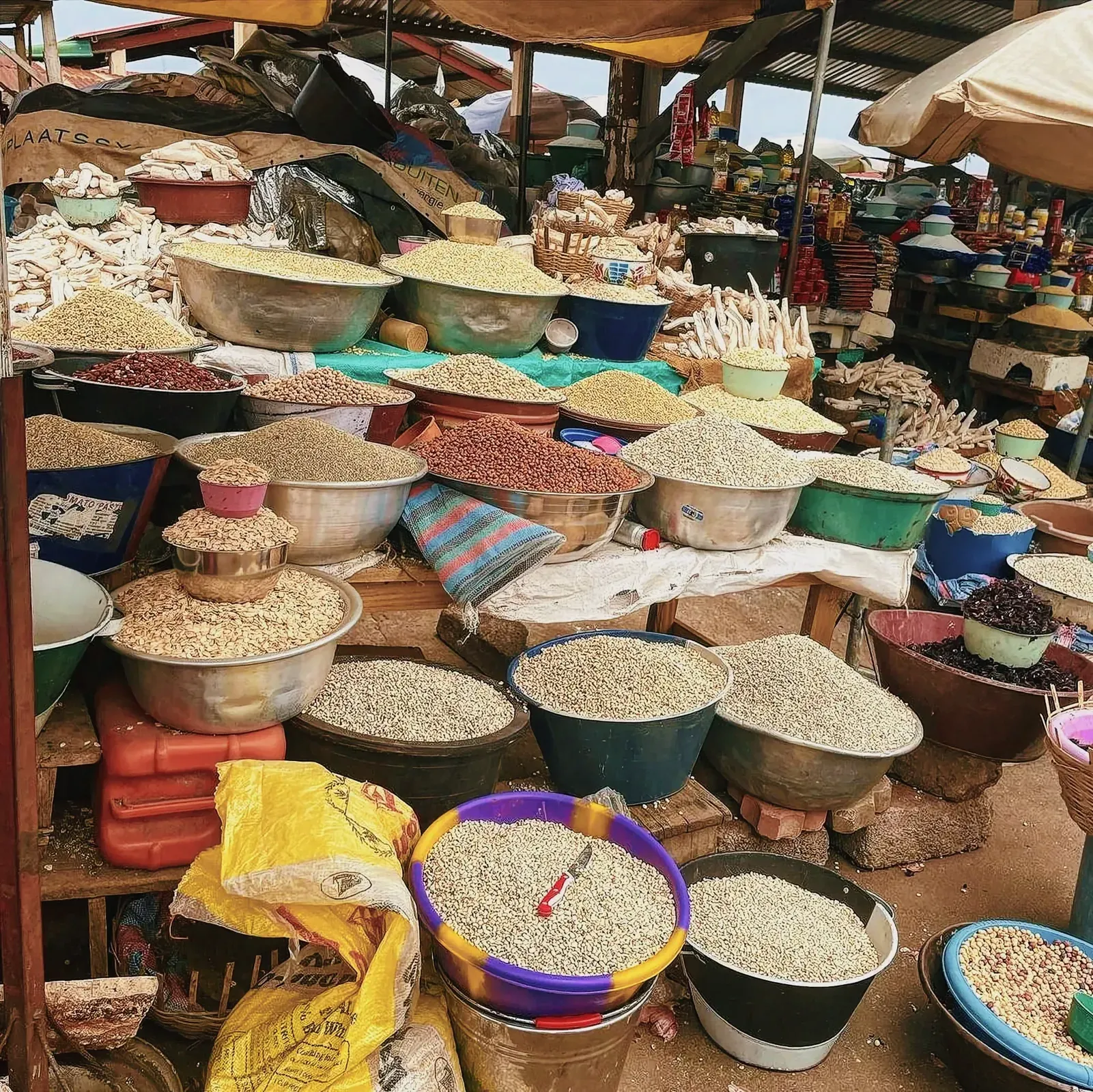 Bustling marketplace with vibrant bowls of beans in Togo