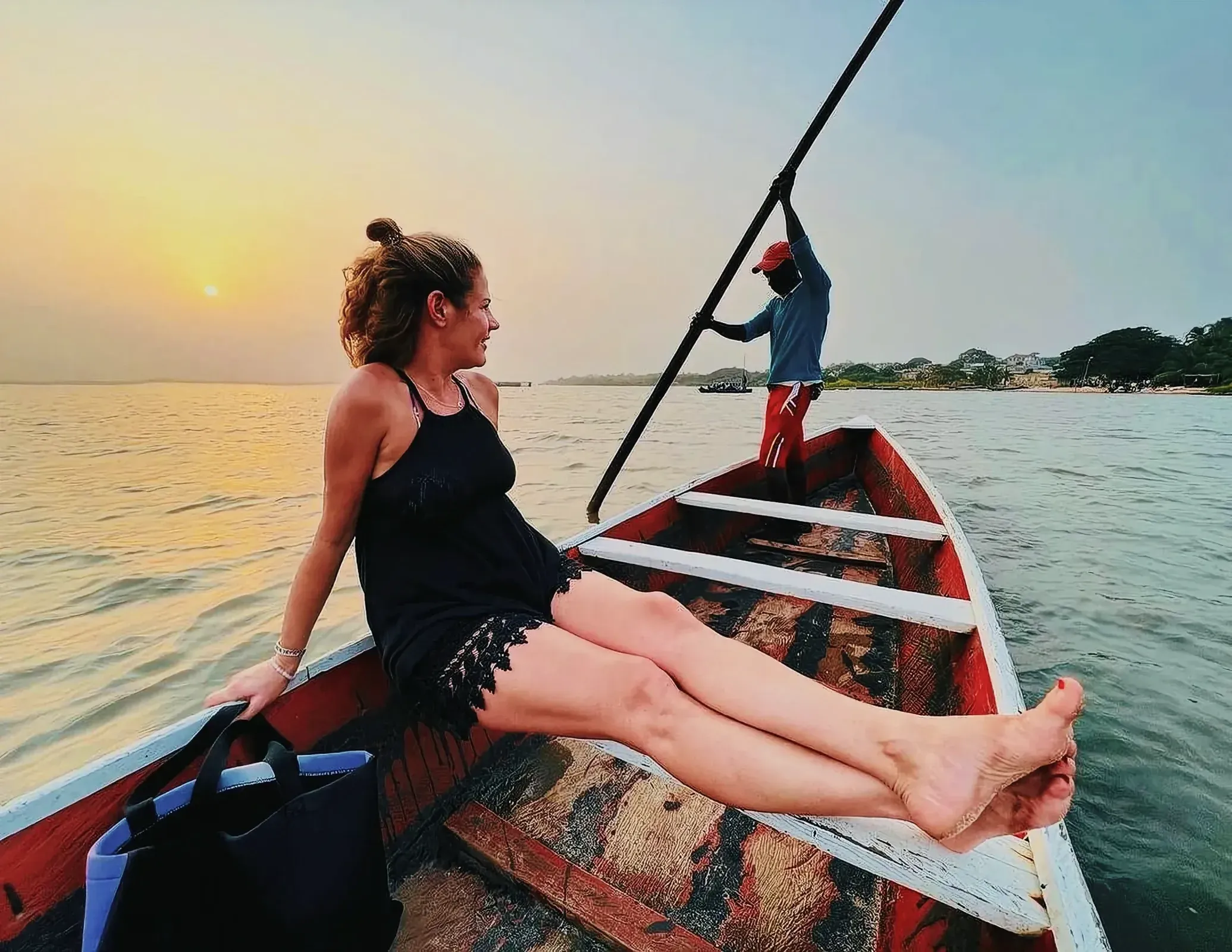 Woman enjoying leisure time on a boat in Togo