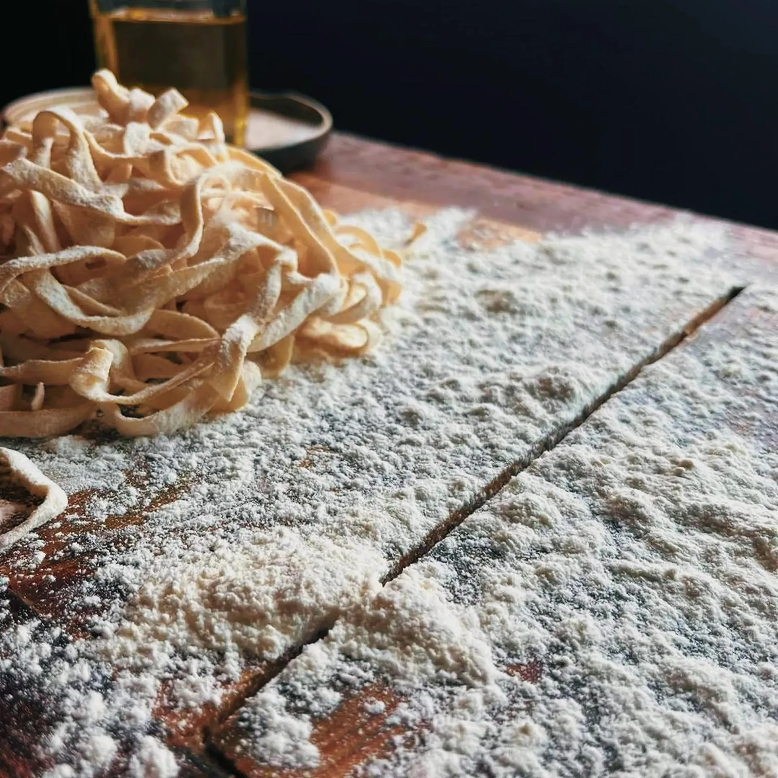 A plate of Tagliolini pasta, ready to be twirled.
